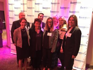 group photo Lisa Clare Kombrink and several women accepting Top 50 women LIBN award